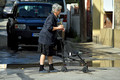 DG383208. Granny with shopping trolley pram. Lardos. Rhodes. Greece. 21.10.2022.