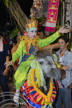 DG132459. Boy & dancing horse. Yi Peng festival. Chiang Mai. Thailand. 29.11.12.