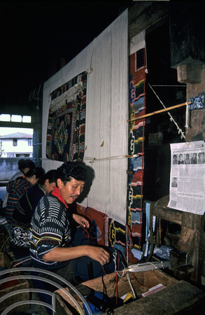 T6951. Carpetmaker. Refugee centre. Darjeeling. W Bengal. India 1998.