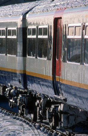 11672. Icicles on the side of a Class 3176xx unit. Hornsey. 31.01.03