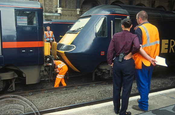 12385. 91129. Staff watch the 91attaching to 43120 to work the 16.00 KX - Aberdeen. 16.07.03