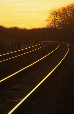 21037. Sunset along the tracks at Washstones level crossing. 13.2.01