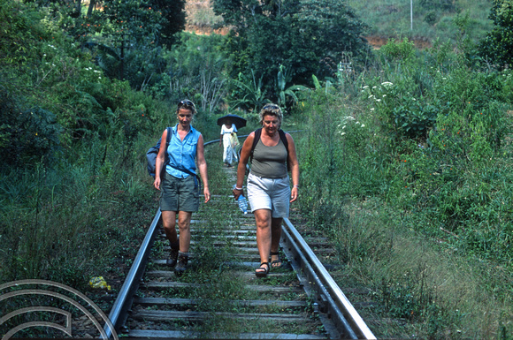 17045. Lynn and Alison walking the tracks. Ella. Sri Lanka. 02.01.04