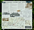 DG401964. Former station history board. St Ives. Cambridgeshire. 7.9.2023.