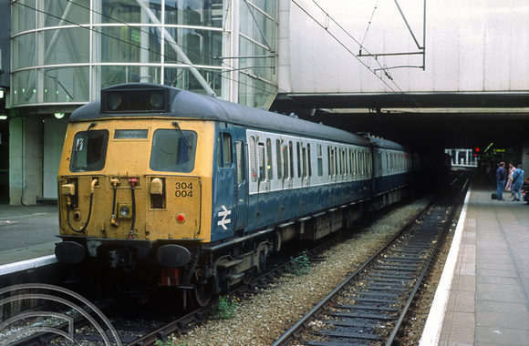 03879. 304004. On a Wolves service. Birmingham New St. 2.6.1994