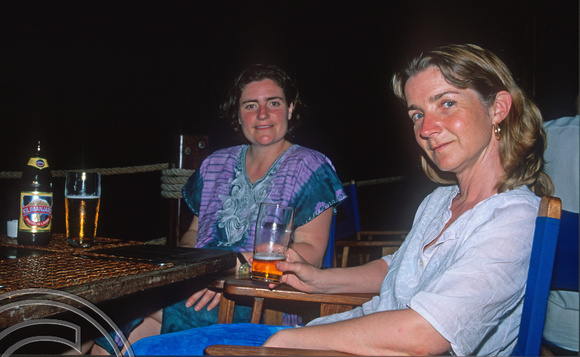 T10900. Clare and Lynn at the Blues restaurant. Stone Town. Zanzibar. Tanzania. Africa. 19th May 2001