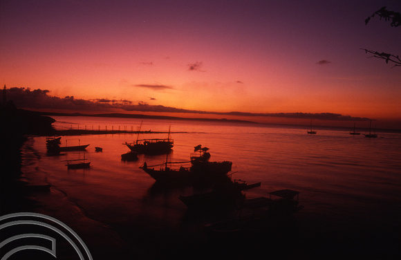 T04134. Sunset over the harbour. Semau Island. Timor. Indonesia. 14th September 1992