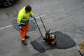 DG412234. Fixing potholes. Scarr Bottom Rd. Halifax. West Yorkshire. 7.3.2024.