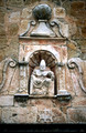 T15327. worn stone statue on the local church. Pals. Catalonia. Spain. 19.04.2003