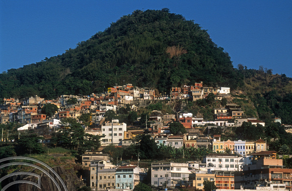 T13473. Houses climb the hills in the Catete district. Rio de Janeiro. Brazil. 7.8.2002