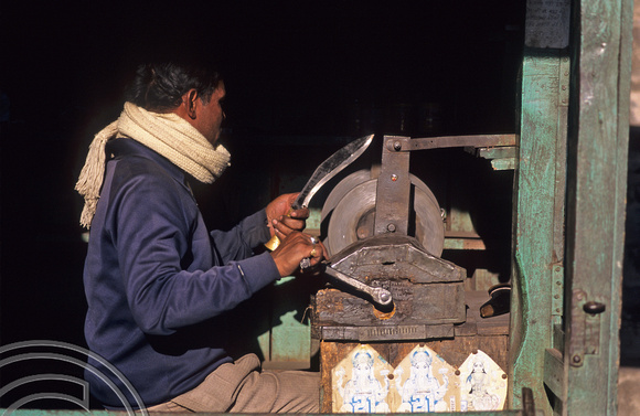 T6989. Kukri sharpening. Darjeeling. W Bengal. India 1998.
