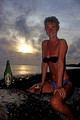 T9158. Lynn and a Cook's beer at Sunset. Piri Purito's. Rarotonga. Cook Islands. March 1999