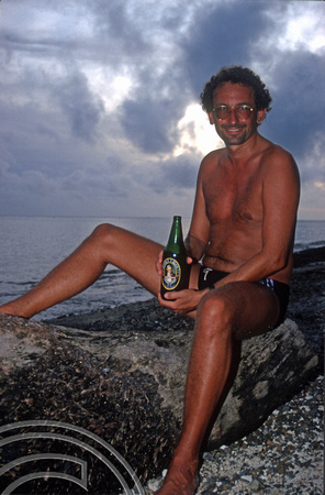 T9160. Me and a Cook's beer at Sunset. Piri Purito's. Rarotonga. Cook Islands. March 1999