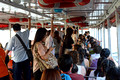 DG205012. Pax on the Chao Phraya river express boat. Bangkok. Thailand. 5.2.15