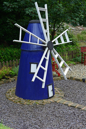 DG248861. Model windmill in the station garden. Hindley. 2.8.16.