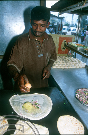 T14920. Making stuffed rotty. Sri Lanka. 2003.