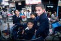 T12585. Kids in a rickshaw. Delhi. India. 2003.