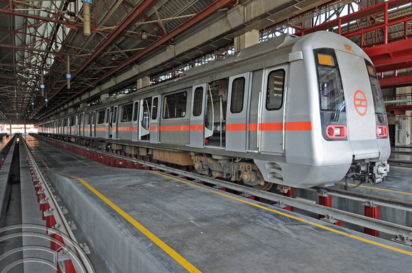 DG76004. 4-car red line train. Shastri Park Depot.Delhi. India. 7.3.11.