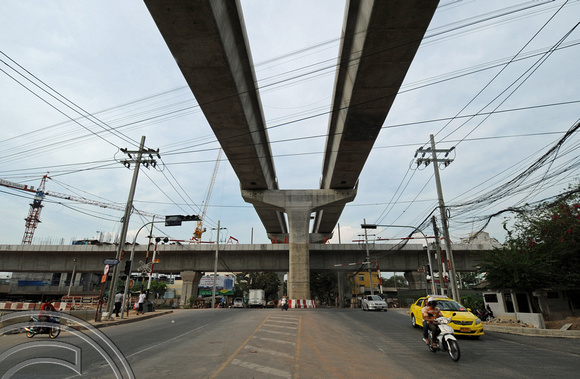 DG106250. Crossing the Red route at Pracharet Road. Bang Sue. Bangkok. Thailand. 5.3.12.