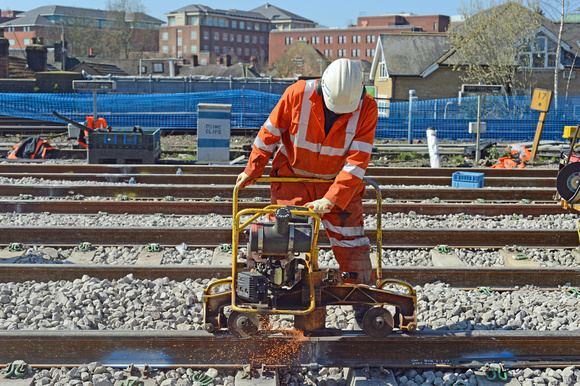 DG210230. Grinding a rail weld. Watford Junction. 6.4.15