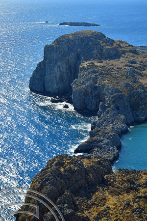 DG382958. Cliffs by St Paul's bay. Lindos. Rhodes. Greece. 16.10.2022.