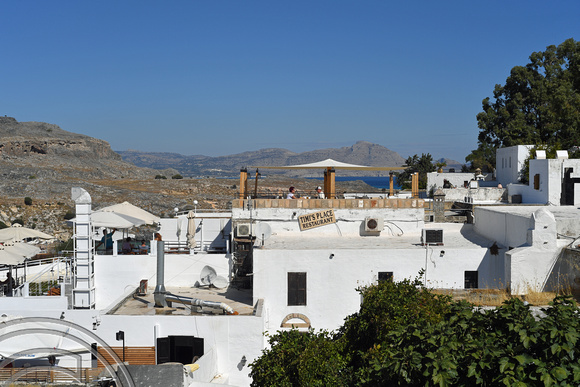 DG382989. Rooftops. Lindos. Rhodes. Greece. 16.10.2022.