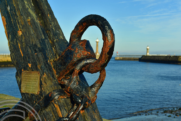 DG383854. Old anchor on the harbour. Whitby. North Yorkshire. 13.11.2022.