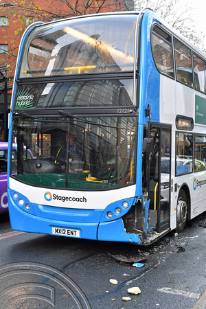 DG383907. Bus damaged by a hit and run. Piccadilly. Manchester. 16.11.2022.