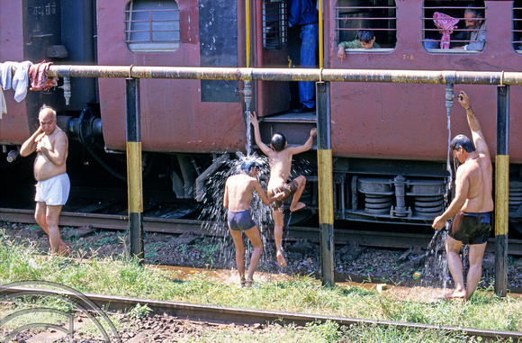 T6309. Time for a shower. Ernakulam Jn. Kerala. India. 1997.