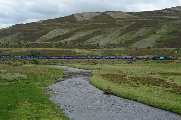 DG217694. 4D47. 13.19 Inverness to Mossend intermodal at Dalwhinnie. 14.7.15