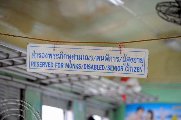 TD12830. 4133. reserved seats for monks. Hualamphong. Bangkok. Thailand. 11.2.2009.