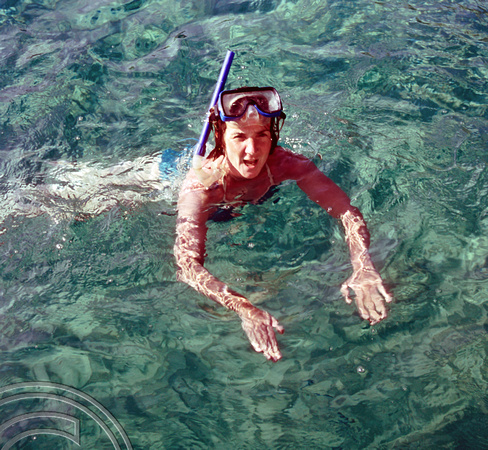 T13817. Lynn snorkelling. Fernando de Noronha. Brazil 2002.