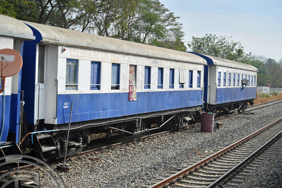 DG389083. Old coaches and wagons used as a works base. Ton Samrong. Thailand. 10.2.2023.