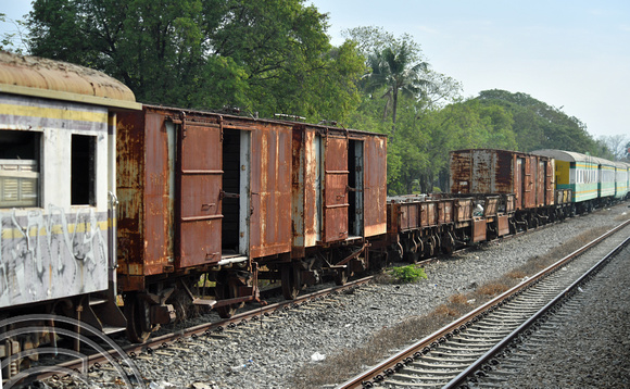 DG389076. Old coaches and wagons used as a works base. Ton Samrong. Thailand. 10.2.2023.