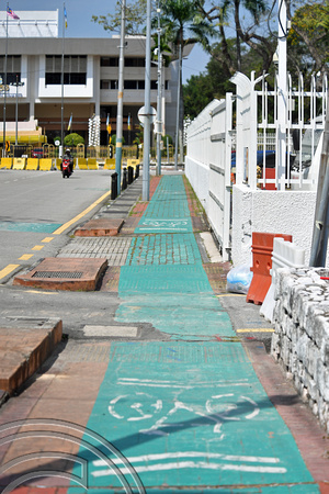 DG389703. Useless cycle path. Jalan Masjid Kapitian Keling. Georgetown. Penang. Malaysia. 23.2.2023.