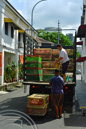 DG389894. Chicken delivery. Georgetown. Penang. Malaysia. 27.2.2023.