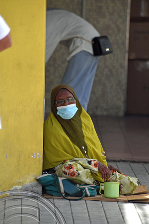 DG389736. Old woman begging. Jalan Penang. Georgetown. Penang. Malaysia. 24.2.2023.