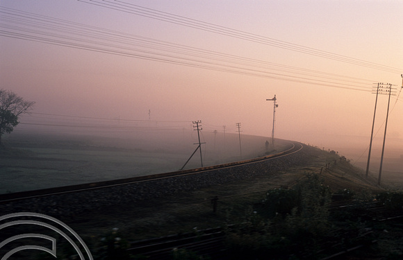 T6895. Dawn on the train to New Jaipalguri. West Bengal. India. 1998.