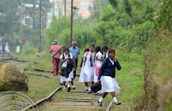 DG238154. Schoolkids on the tracks. Haputale. Hill Country. Sri Lanka. 18.1.16.