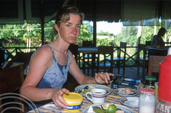 T11144. Lynn having breakfast at the Kendwa Rocks Hotel. Zanzibar. Tanzania. Africa. 28.05.01