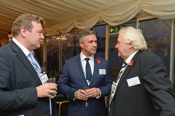 DG233197. Alex Burrows and Terence Watson of Alstom with Nigel Harris of RAIL. Rail Forum East Midlands. London. 2.11.15.