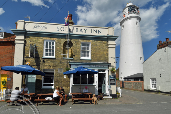 DG398202. Sole Bay Inn and lighthouse. Southwold. Suffolk. 21.6.2023.