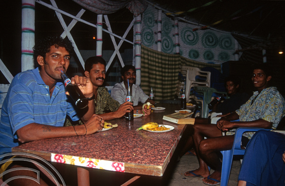 T6102. Sunni's opening night staff party. Arambol. Goa. India. December 1997