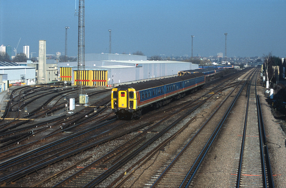 11846. 3414. Speeds past Wimbledon Park depot. London. 19.2 2003