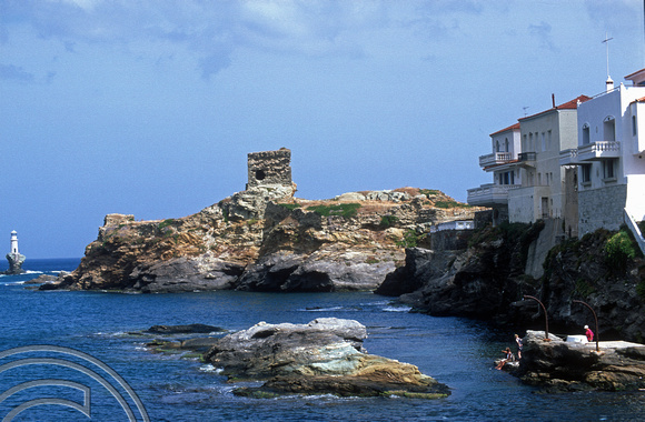 T14188. Homes overlook the sea and the Venetian Castle. Hora. Andros. Cyclades. Greece. 24.09.02