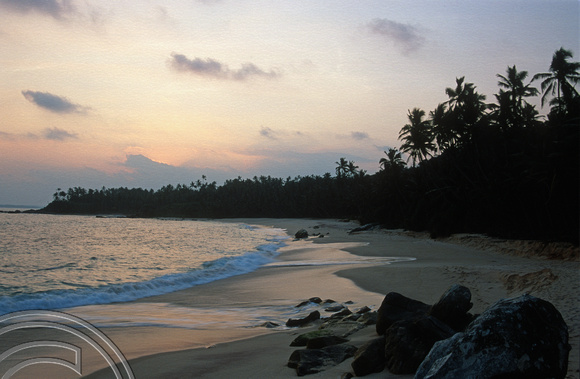 T14397. Looking along 'silent beach' over the headland. Goyambokka. Tangalle. Sri Lanka. 26.12.02