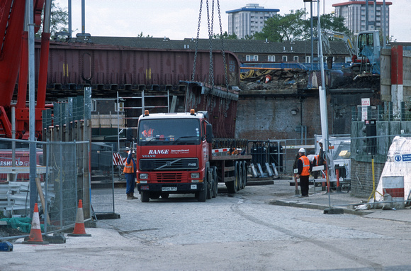 11224. Lorry removing an Eastern deck span. St Pancras. London. England 26.10.02
