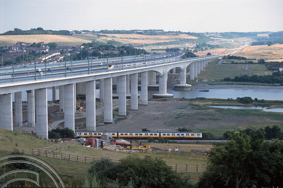 12491. 3312 and 3313 cross the Medway Viaduct on a test working whilst a Connex 508 passes below. 11.7.03