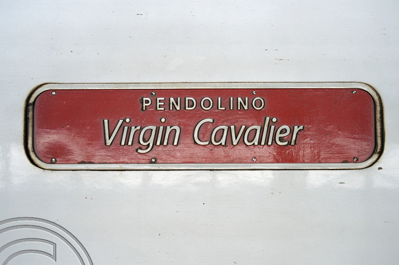 DG159570. Pendolino 390020. Nameplate Manchester Piccadilly. 13.9.13.