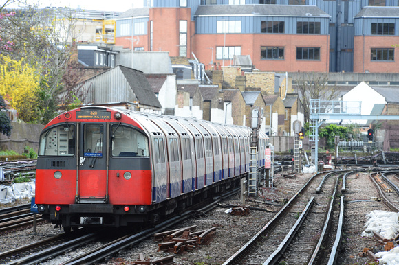 DG243596. Piccadilly line train. Barons Court. London. 25.4.16